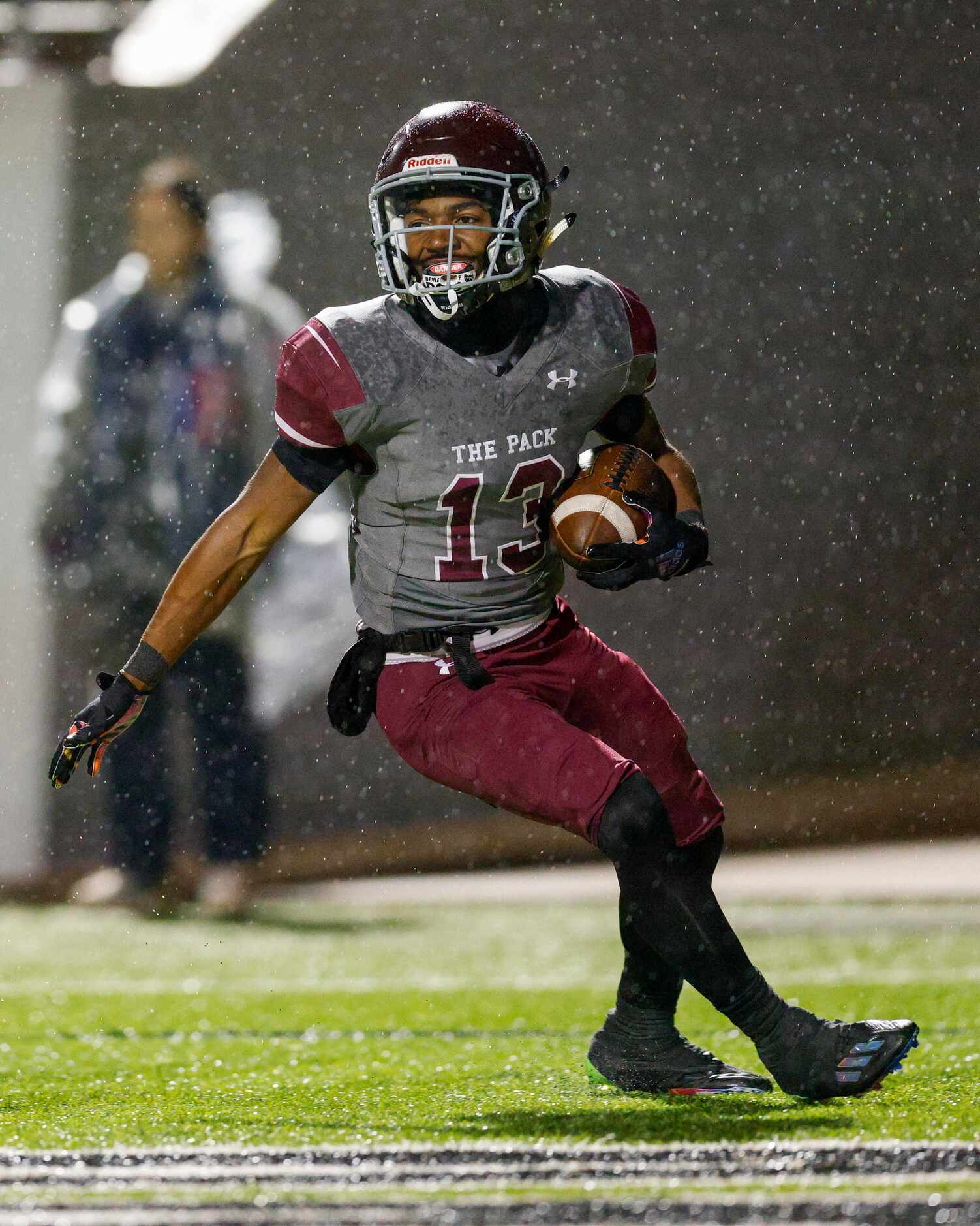 Mansfield Timberview wide receiver Tyler Madison (13) smiles after scoring a touchdown...