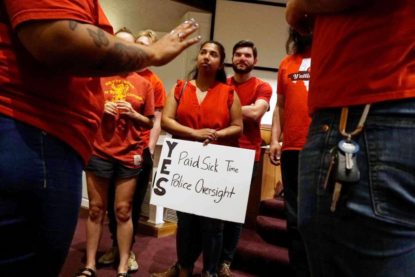 Ananna Anu carried a sign calling for paid sick time when  members of Democratic Socialists...