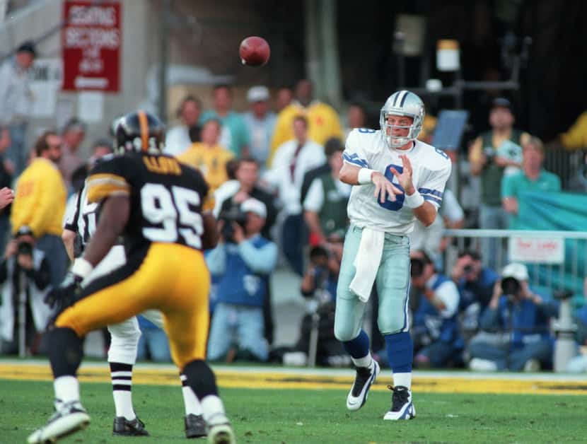 Troy Aikman fires a pass before Pittsburgh's Greg Lloyd can react.