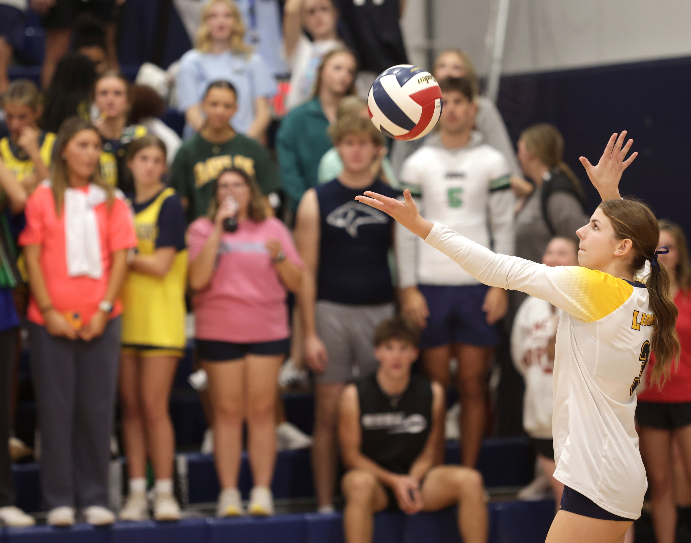 Prestonwood player #3 Audrey Letcher serves the ball during the Ursuline Academy of Dallas...