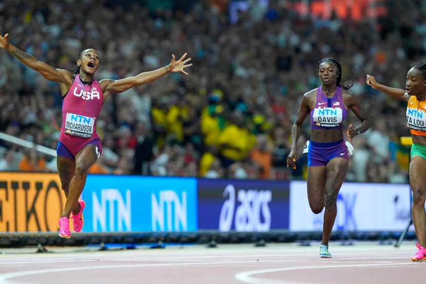 Sha'Carri Richardson of Dallas celebrates after winning the gold medal in the final of the...