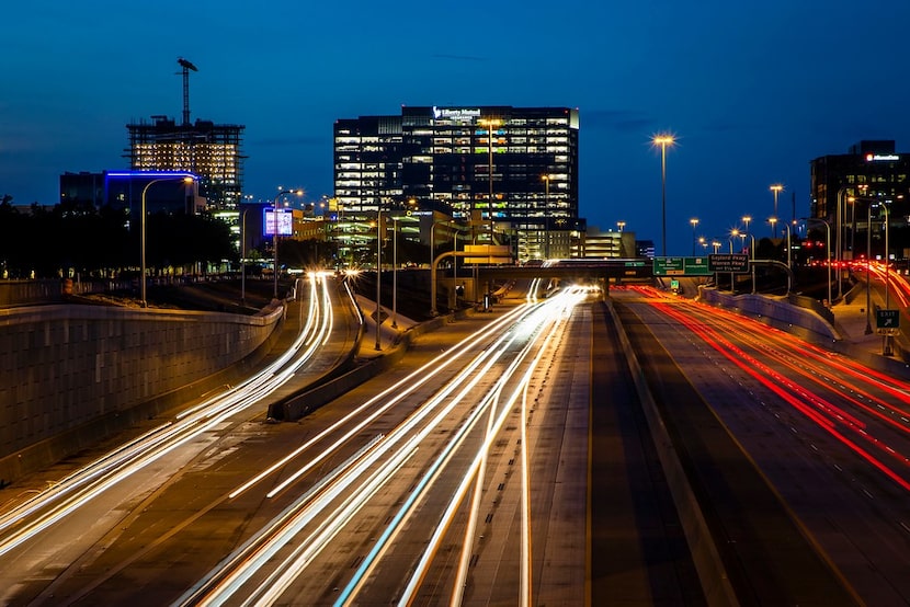 A long exposure shows traffic on the Dallas North Tollway at Tennyson Parkway in Plano.  