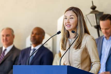 Kourtny Garrett, president and CEO of Downtown Dallas Inc., speaks during a news conference....