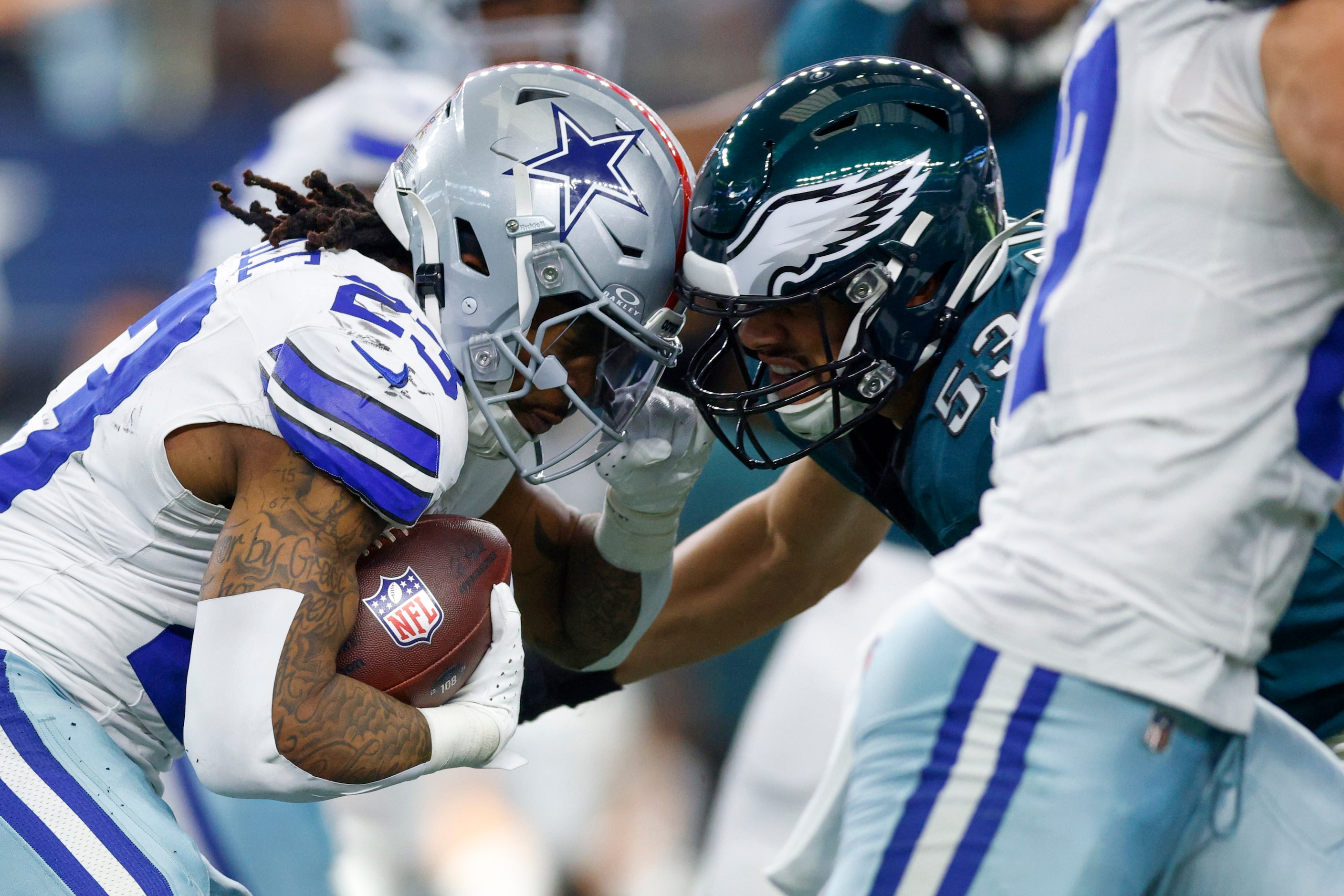 Dallas Cowboys running back Rico Dowdle (23) collides with Philadelphia Eagles linebacker...