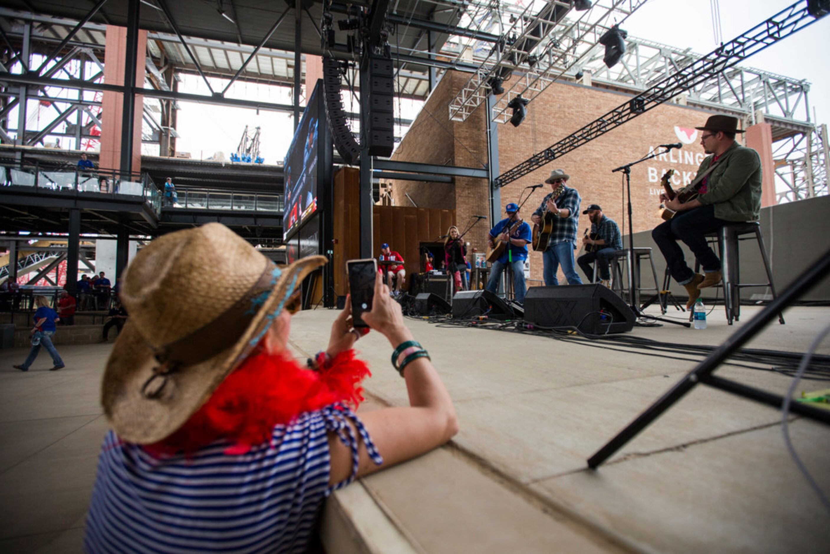 Pat Green and other musicians perform as fans celebrate Texas Rangers Opening Day with...