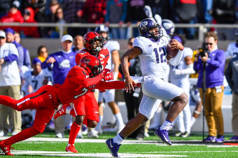 LUBBOCK, TX - NOVEMBER 18: Shawn Robinson #12 of the TCU Horned Frogs outruns Jah'Shawn...