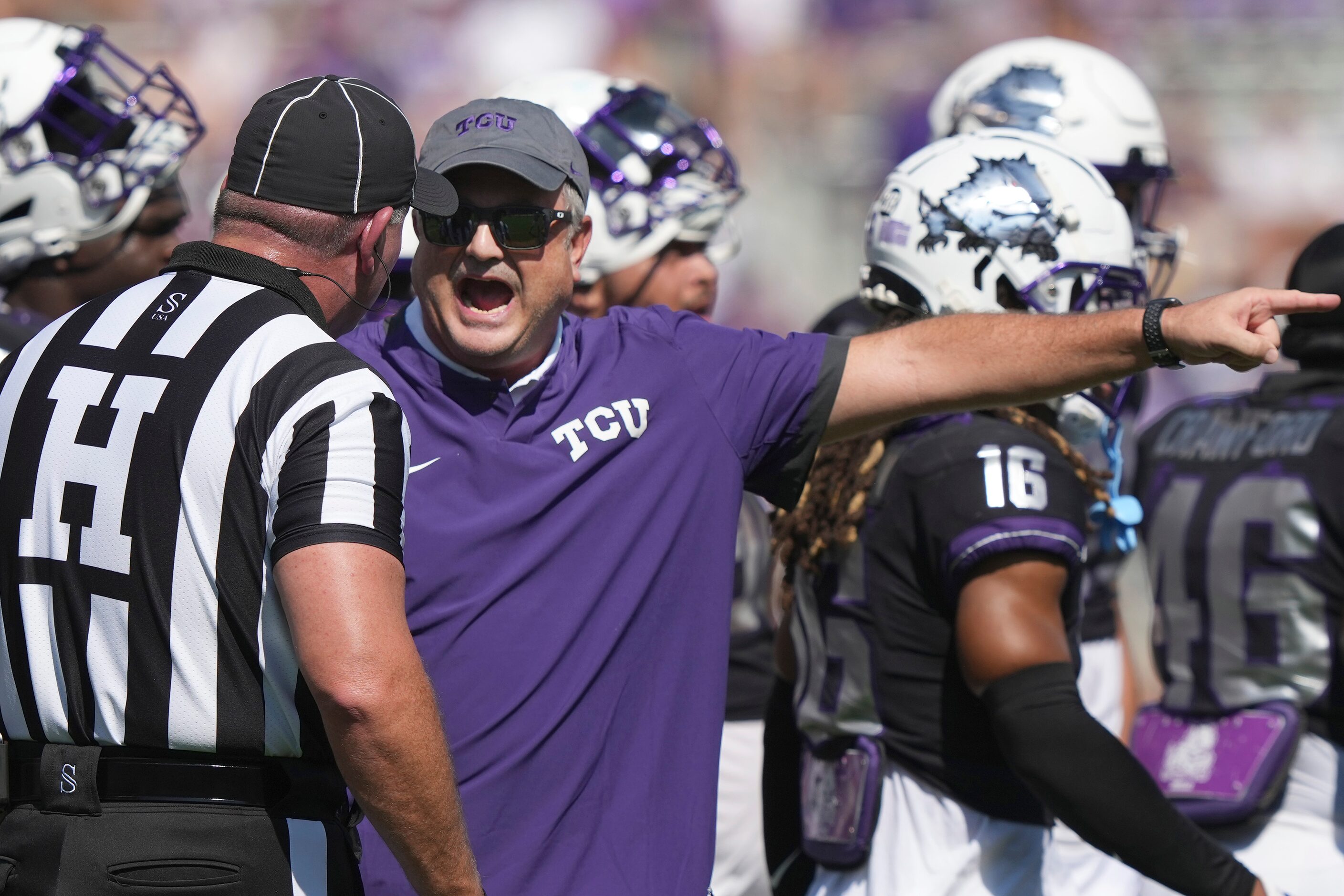 TCU head coach Sonny Dykes yells at an official during the first half of an NCAA college...