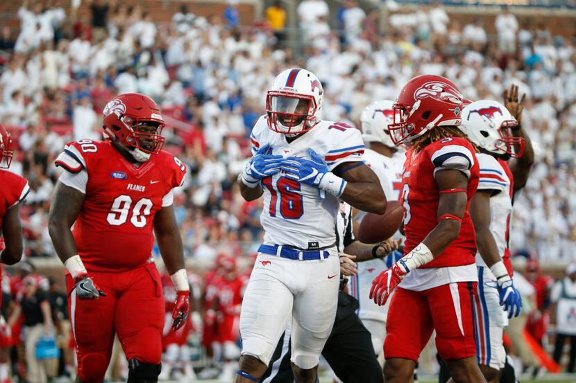 Southern Methodist Mustangs wide receiver Courtland Sutton (16) celebrates after he runs the...