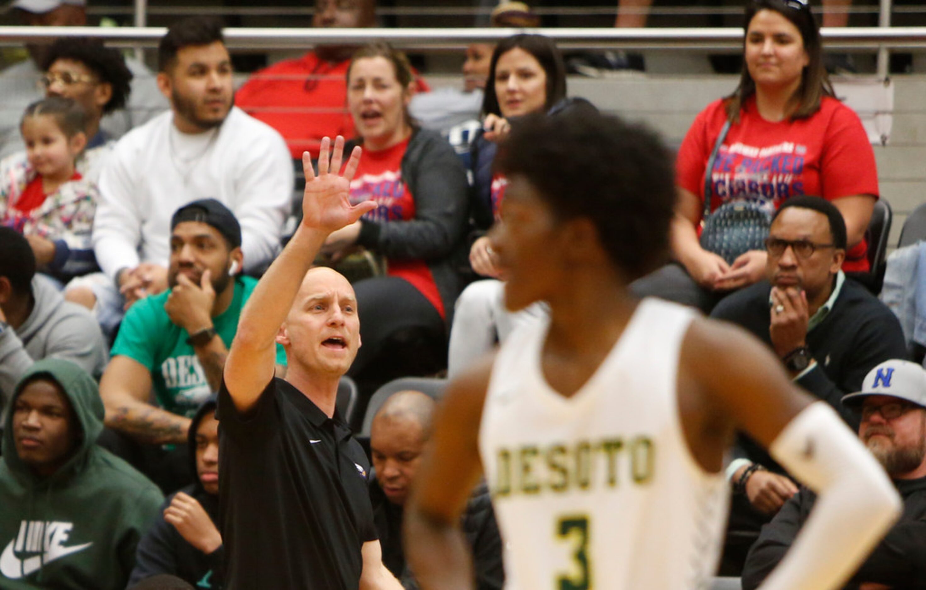 Richardson head coach Kevin Lawson directs his players during the final quarter of play...