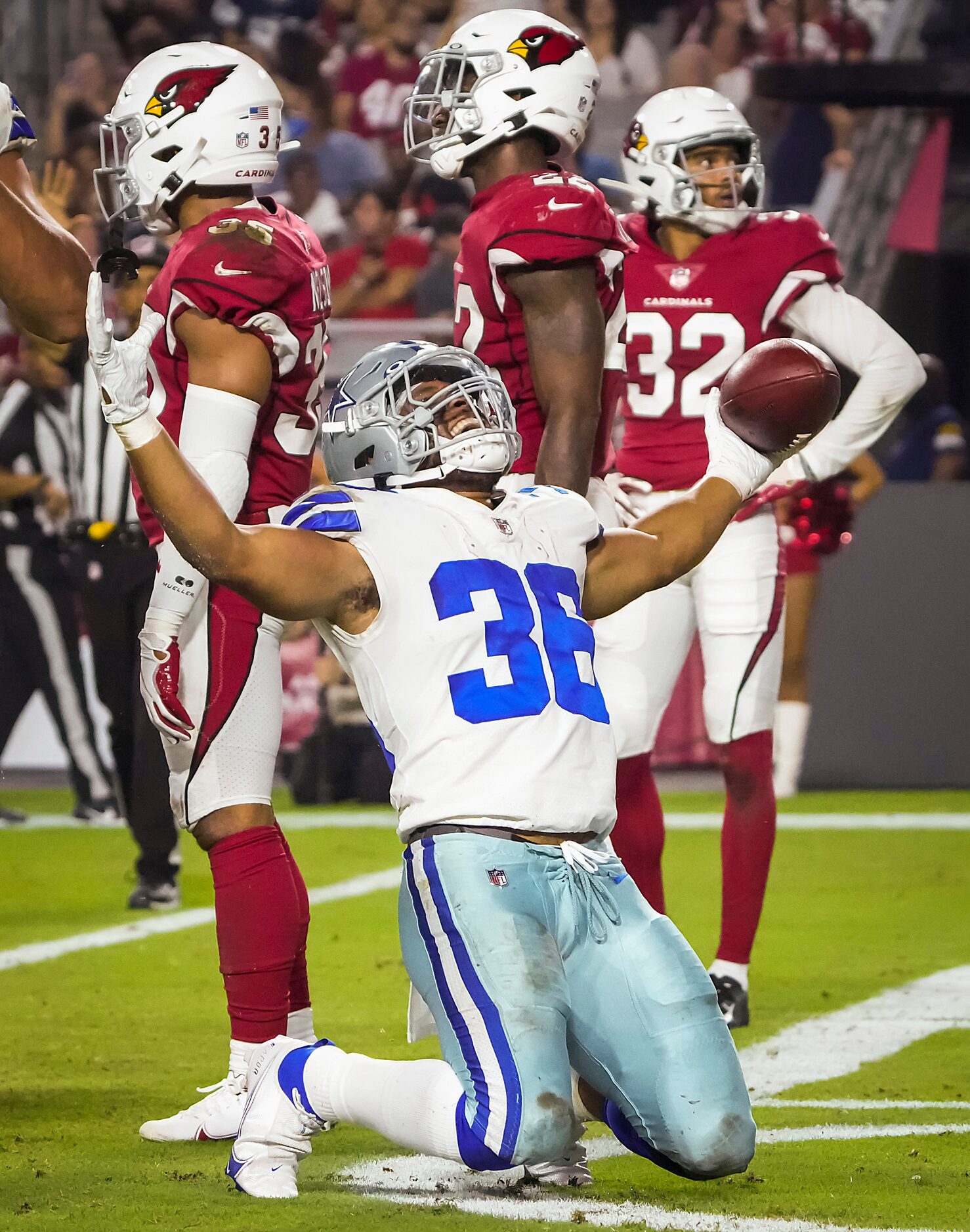 Dallas Cowboys running back Brenden Knox (36) celebrates after picking up a first down on...