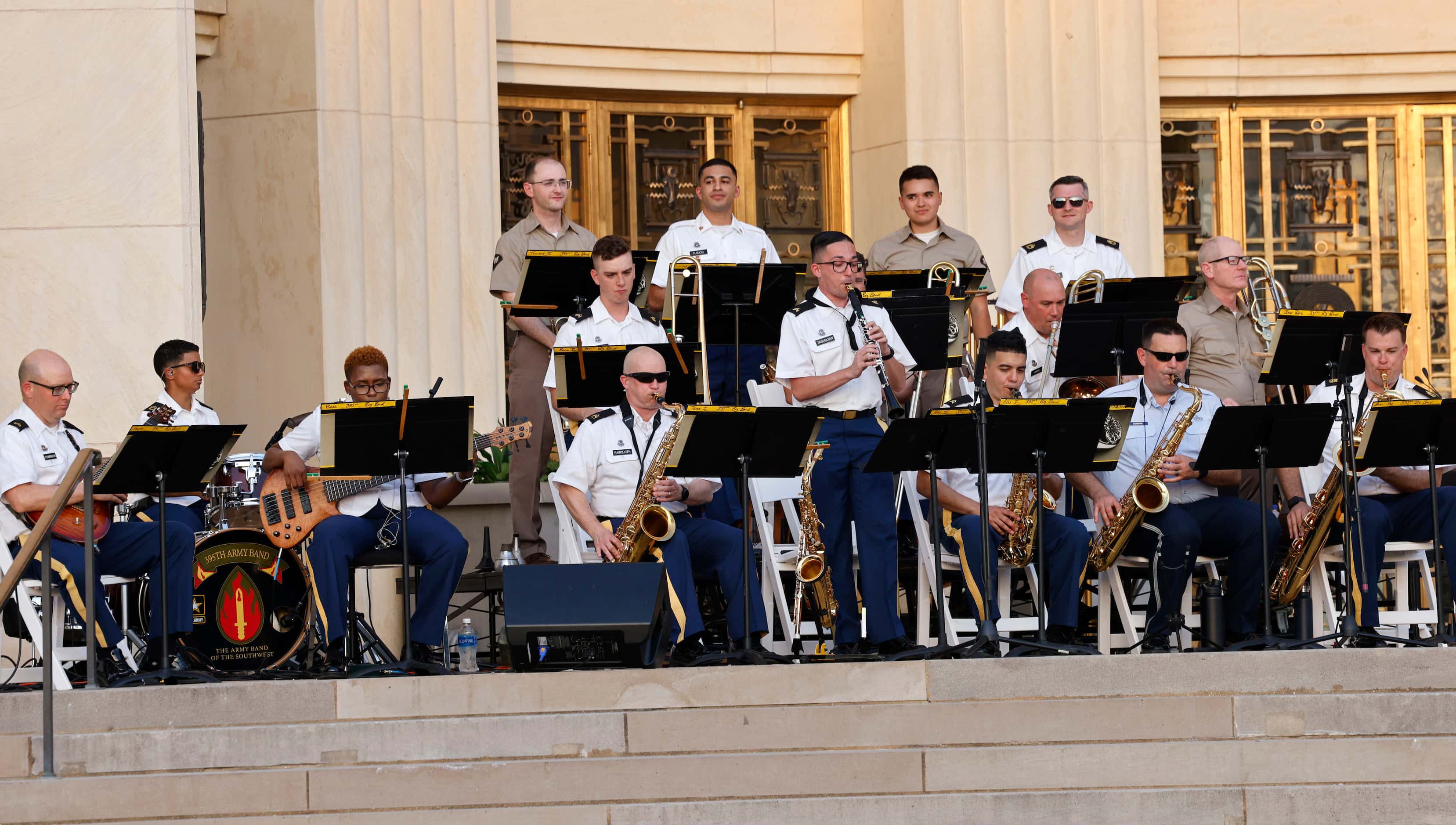The 395th Army Reserve Band performs in front of the Hall of State during the Fair Park...