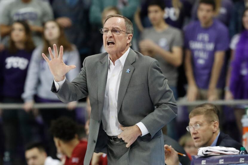 Oklahoma head coach Lon Kruger yells from the sidelines during the first half of an NCAA...