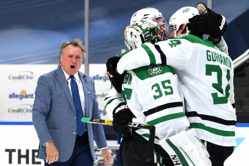 FILE — Head coach Rick Bowness of the Dallas Stars reacts and watches as his players...