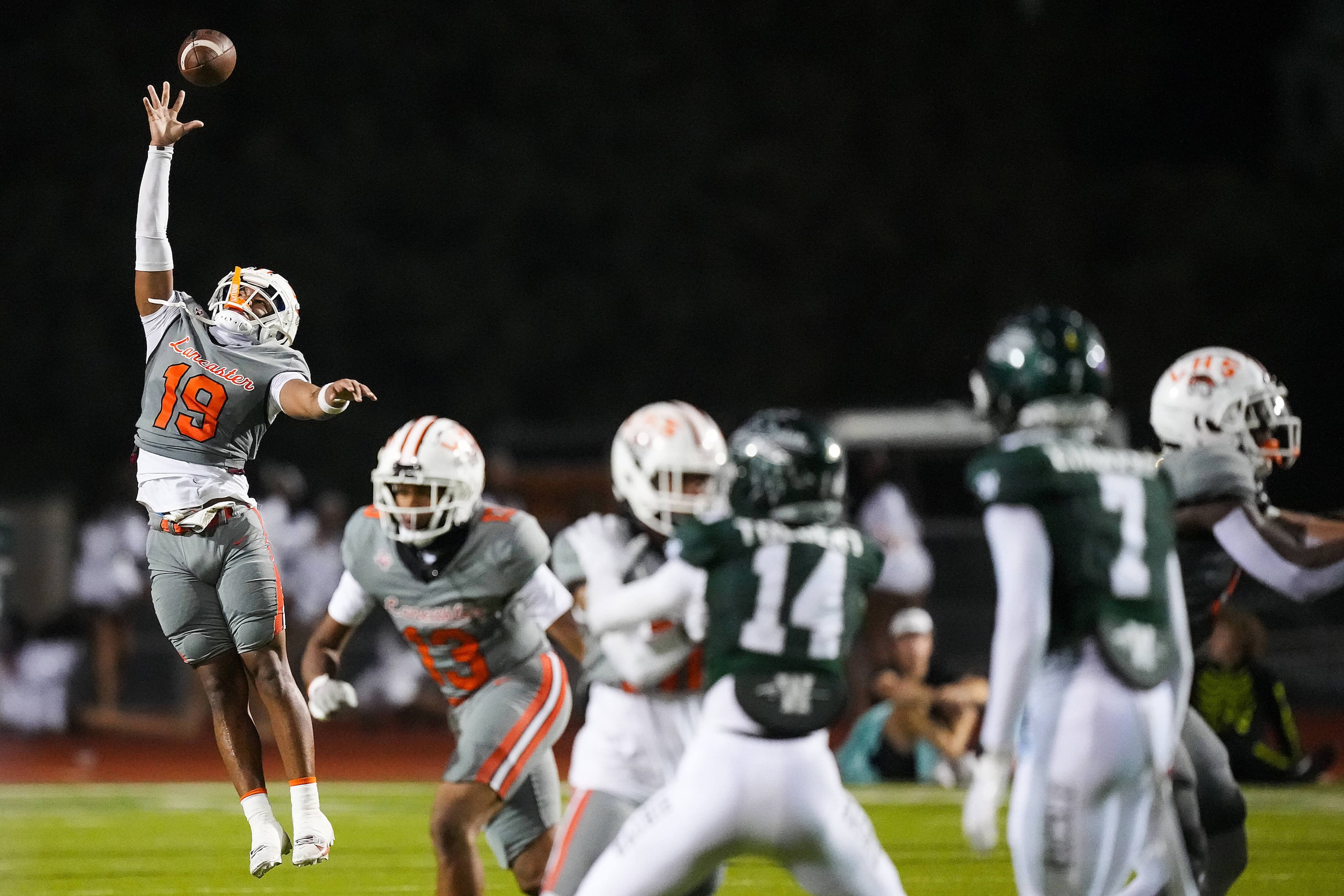 A snap sails over the head of Lancaster punter Ty'Reon Burns (19) during the first half of a...