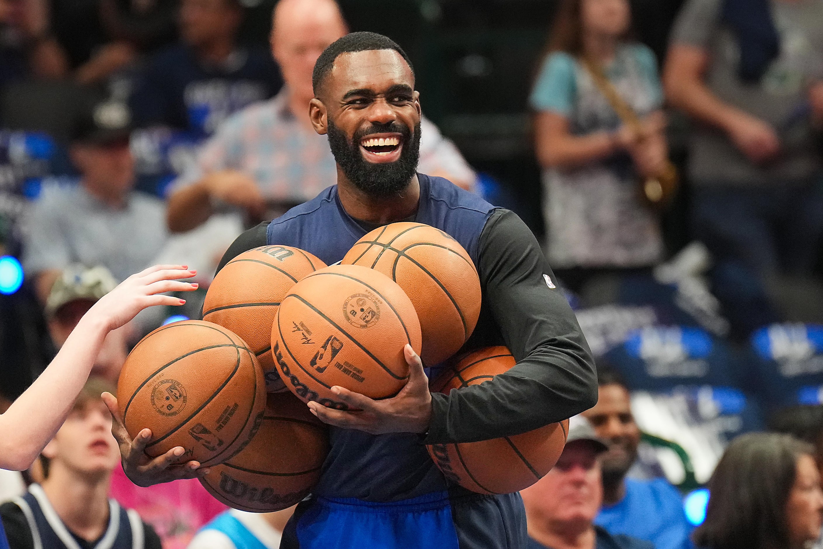 Dallas Mavericks forward Tim Hardaway Jr. warms up before Game 3 of an NBA basketball...