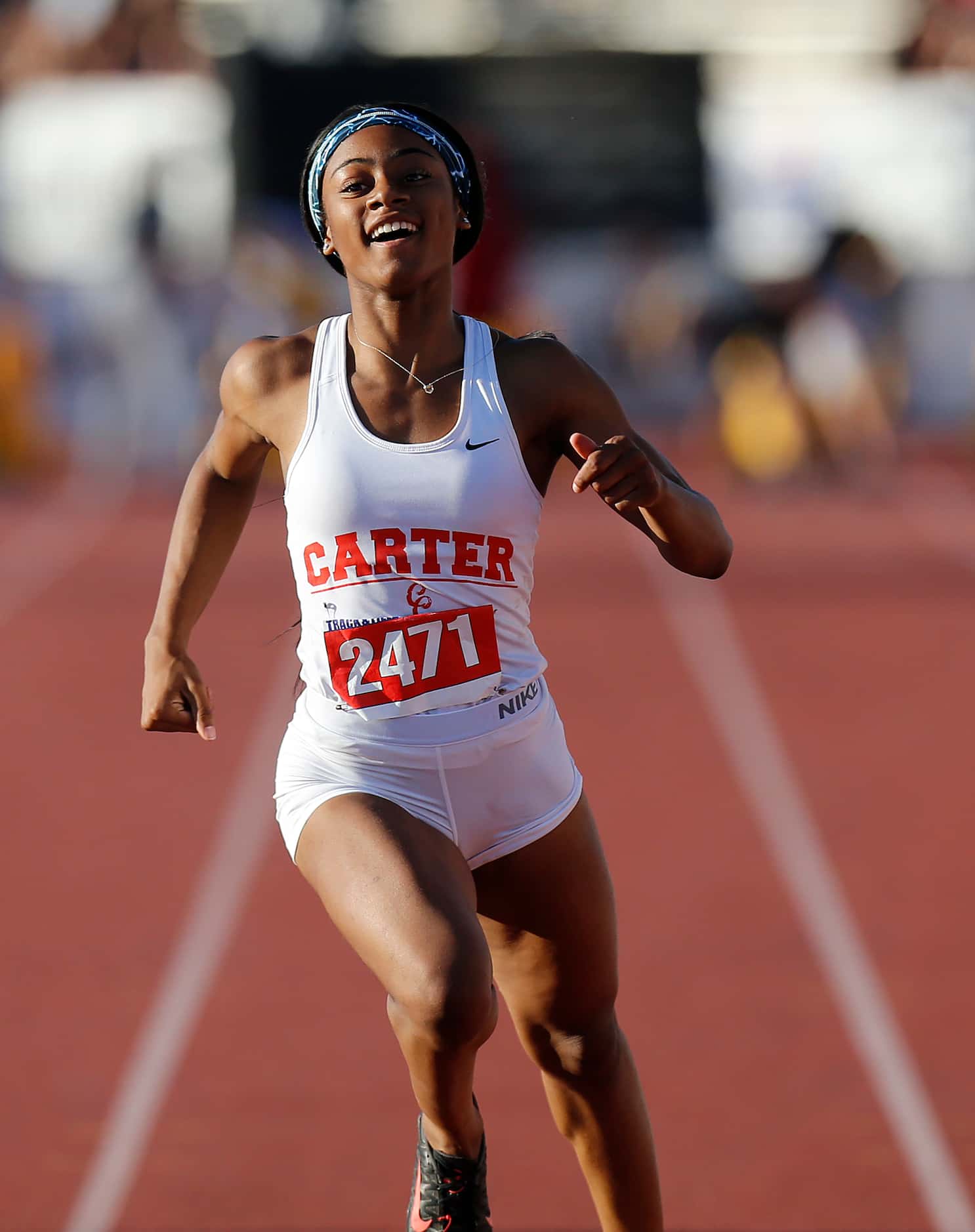 Dallas Carter's Sha'Carri Richardson (2471) finishes first in the class 4A girls 100-meter...