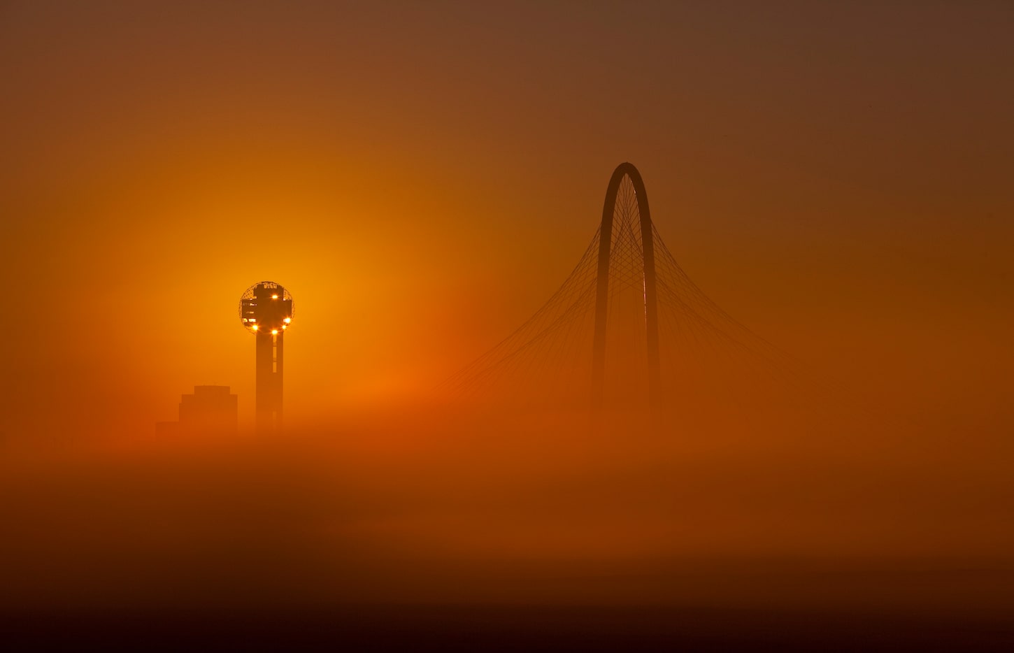 Spanning the Trinity River between downtown and West Dallas, the 400 ft. high Margaret Hunt...