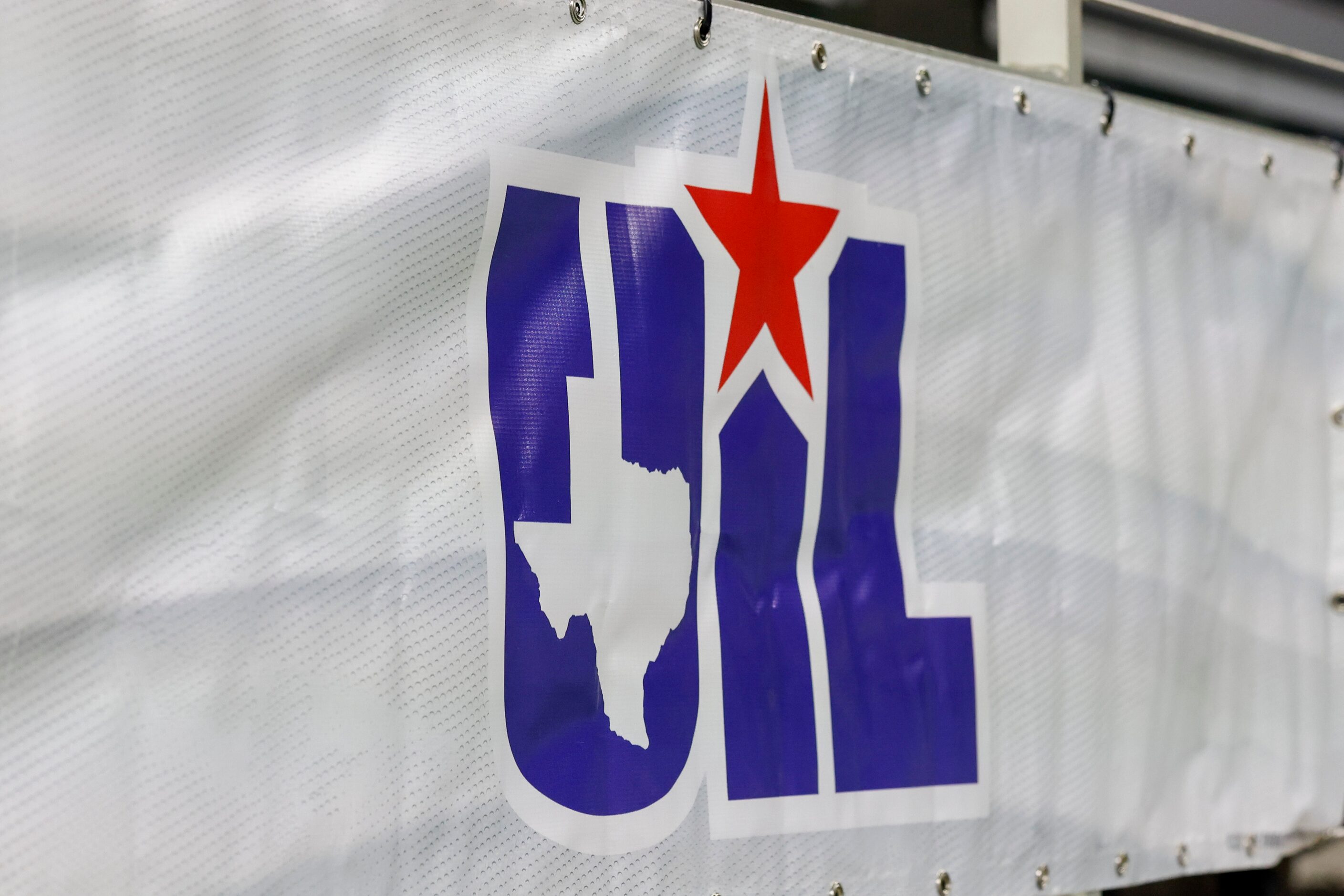 A University Interscholastic League logo sits along a railing during the Class 3A Division...