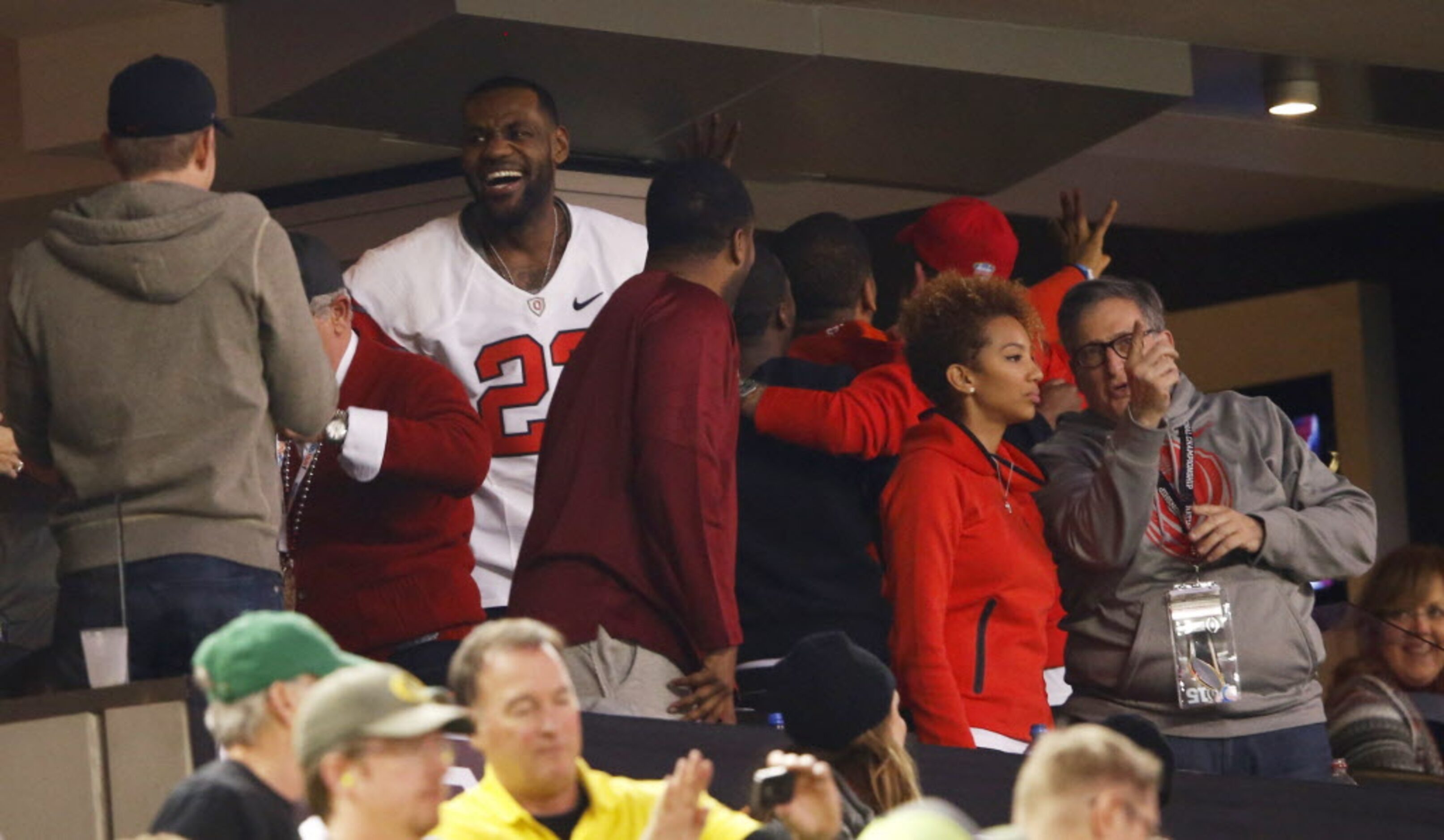 Cleveland Cavaliers LeBron James celebrates a touchdown from Ohio State Buckeyes in a game...