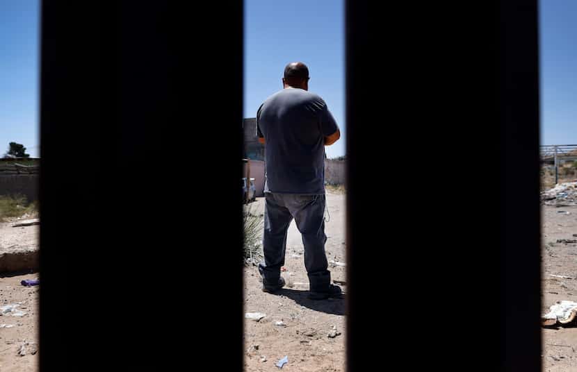Rick, an Anapra resident on the outskirts of Juarez, Mexico, is pictured through the border...