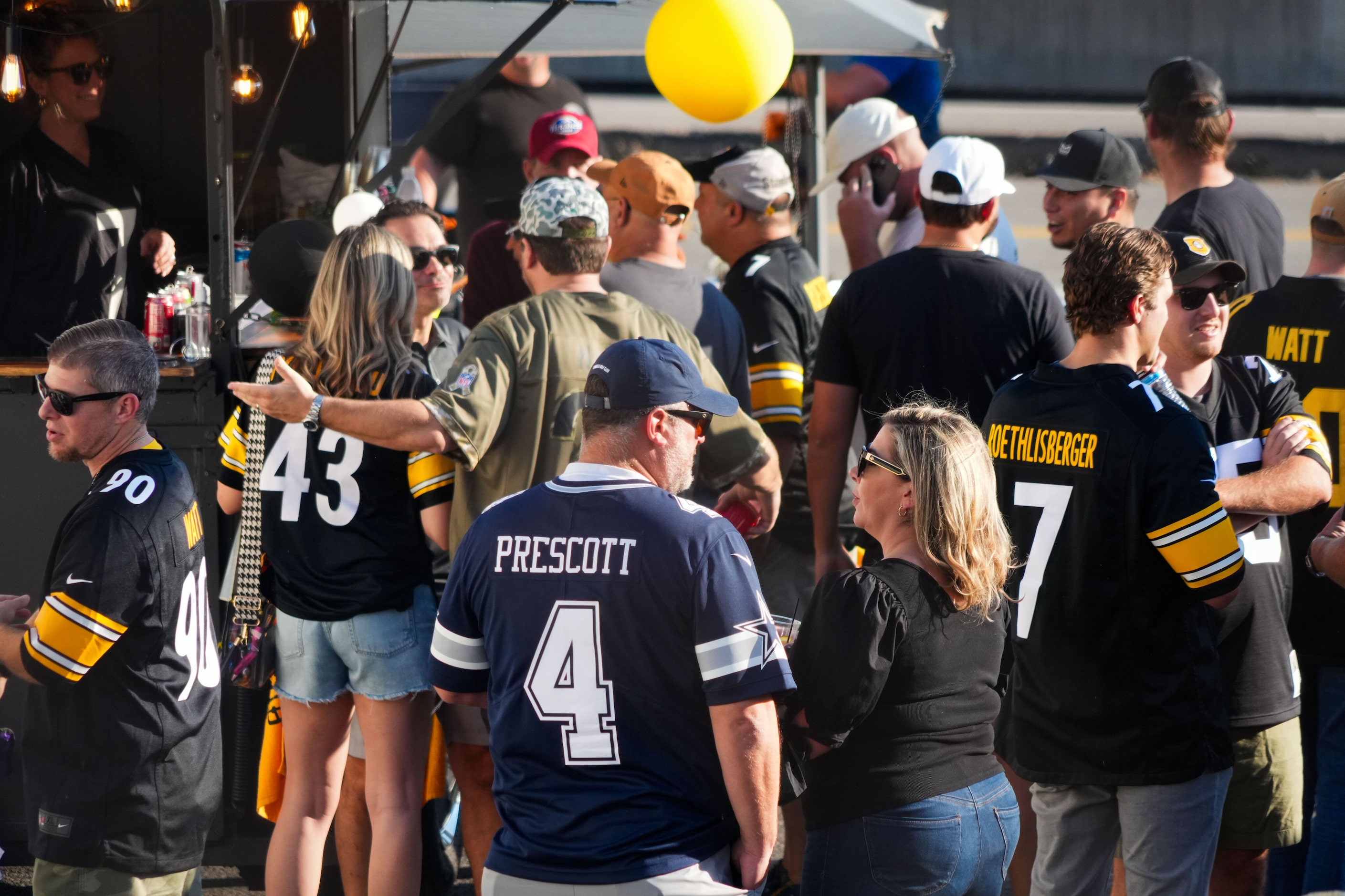 Dallas Cowboys fans tailgate before an NFL football game against the Pittsburgh Steelers on...