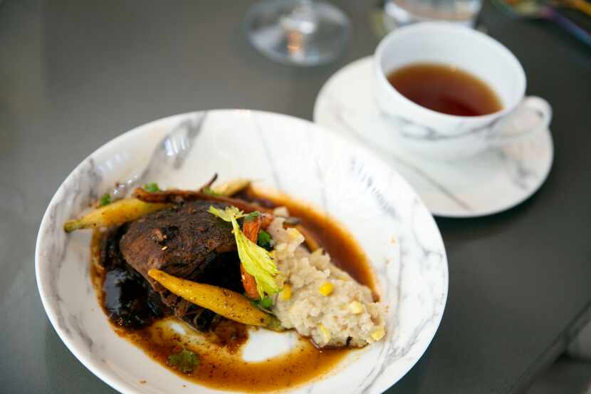 Braised Wild Texas Boar Braise with pecan hibiscus mole, masa mash and carrots was paired...