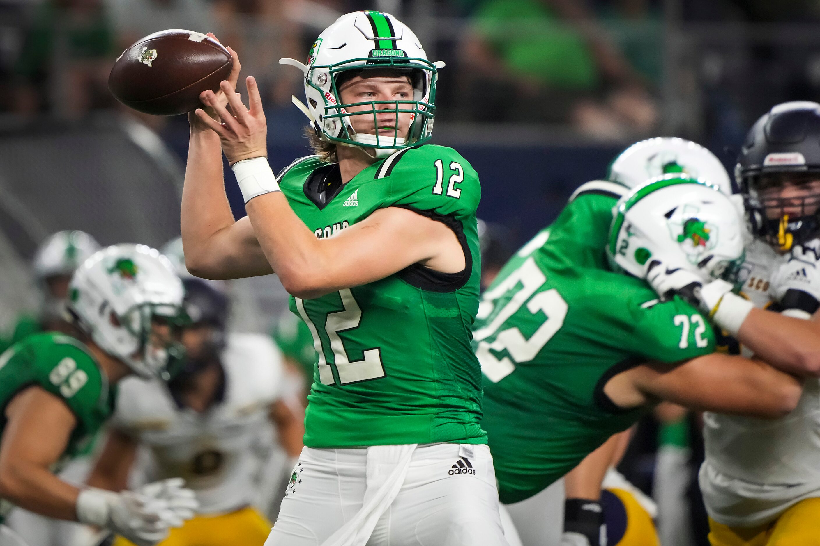 Southlake Carroll quarterback Kaden Anderson (12) throws a pass during the first half of a...