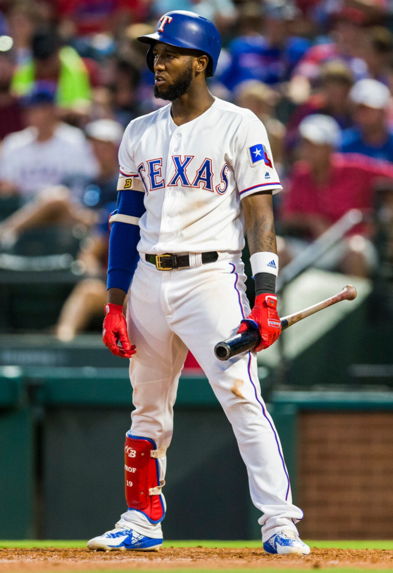 Texas Rangers first baseman Jurickson Profar (19) reacts to a strike during the fifth inning...