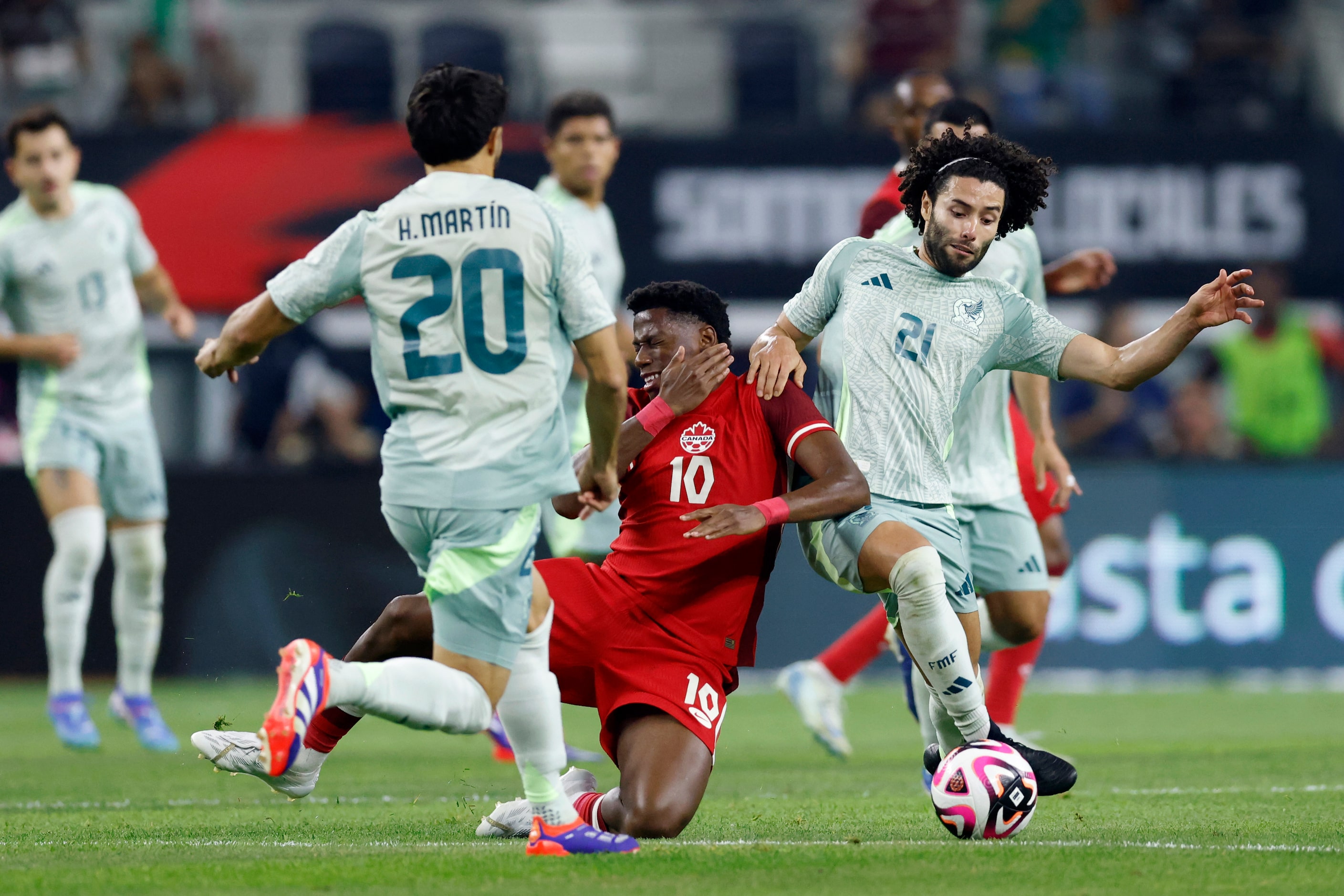 Canada forward Jonathan David (10) reacts after being fouled by Mexico midfielder Cesar...