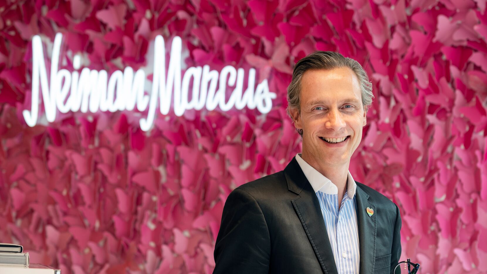 Neiman Marcus loses CFO to struggling retailer Men's Wearhouse