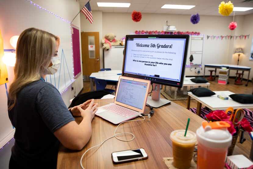 Lauren Martinez, a fifth grade teacher at Northwood Hills Elementary, conducts an online...