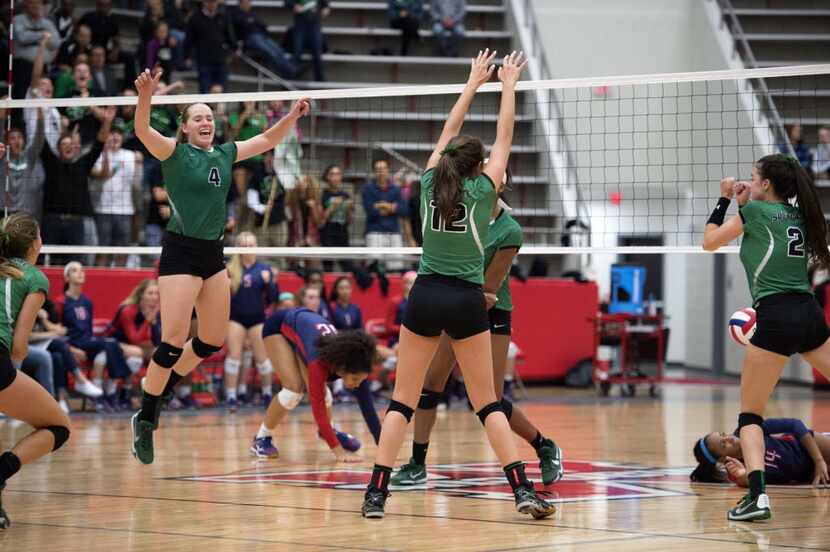 Southlake Carroll celebrates the final point in its victory over Allen in their playoff...