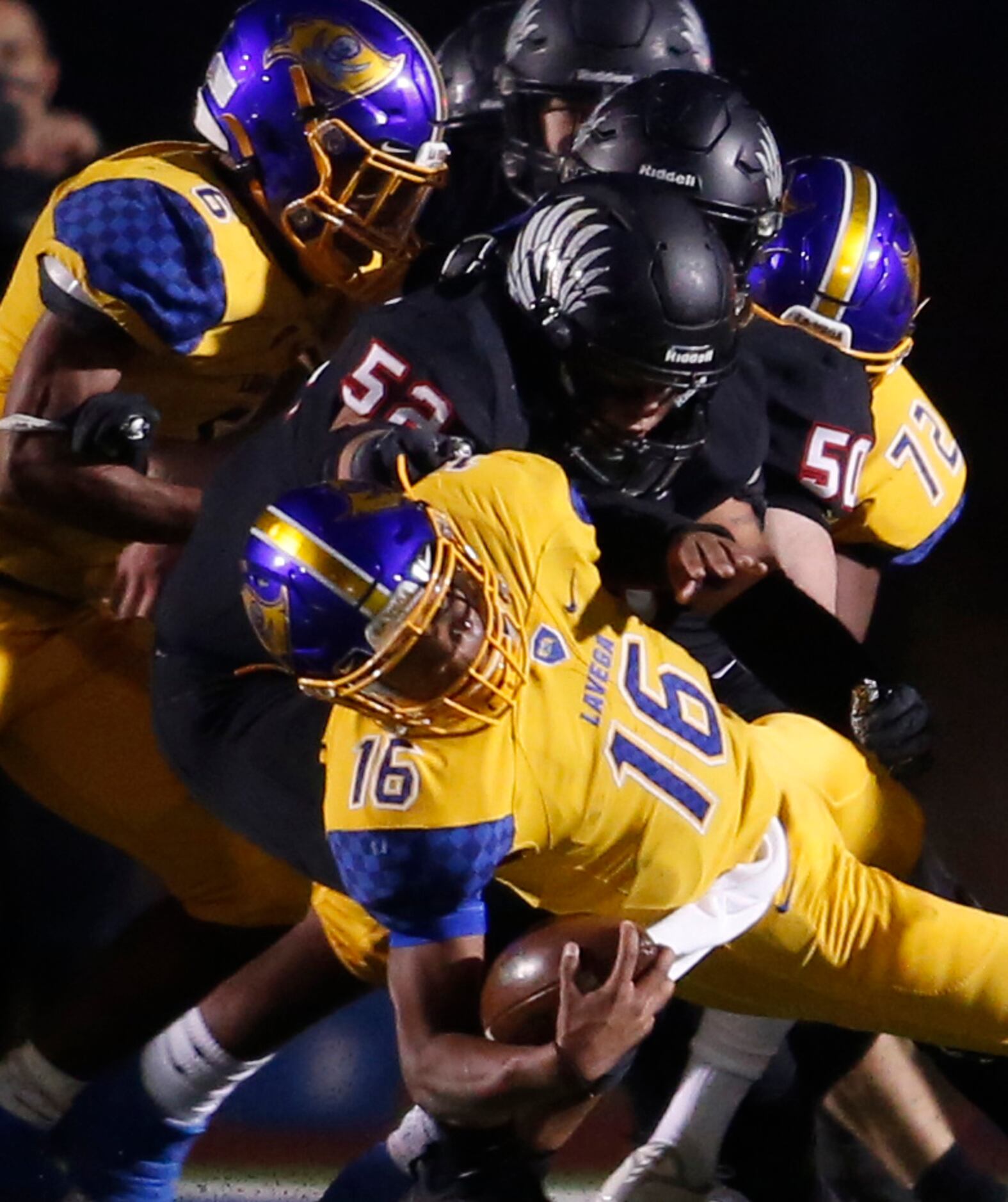 Waco LaVega quarterback Ara Rauls lll (16) is sacked for a loss by a strong defensive front...