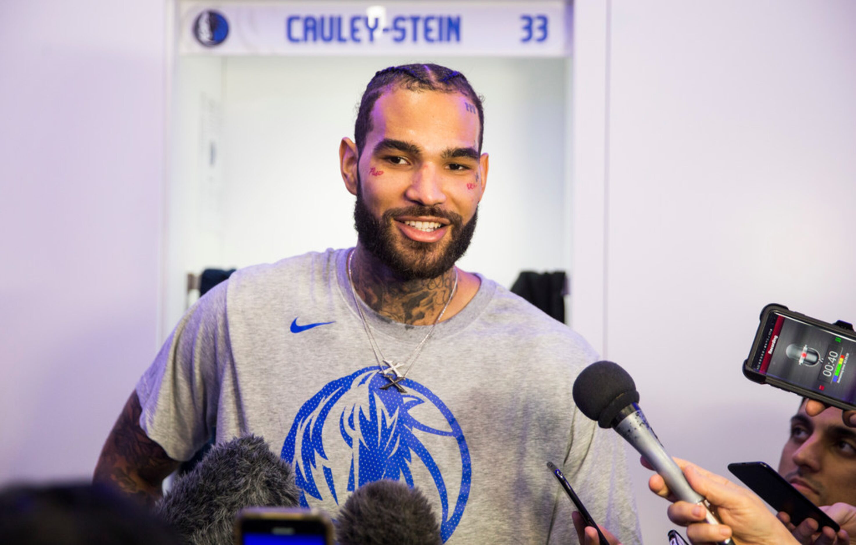 Dallas Mavericks center Willie Cauley-Stein (33) speaks to reporters in the locker room...