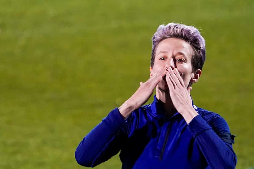 USA forward Megan Rapinoe blows kisses to the crowd after a victory over Japan in a...