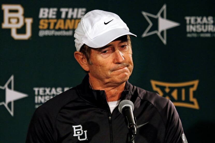 Baylor head coach Art Briles shrugs his shoulders as he discusses with the media the Bears'...