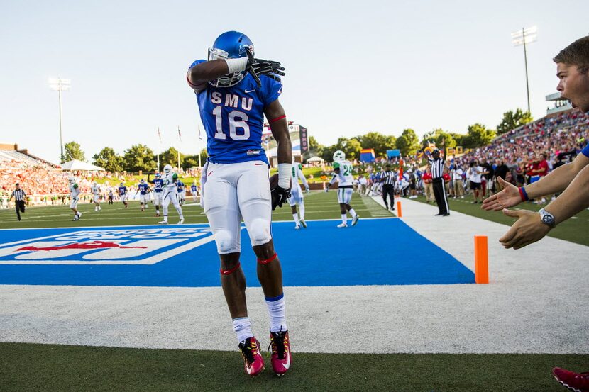 SMU wide receiver Courtland Sutton (16) celebrates after scoring on a touchdown reception...