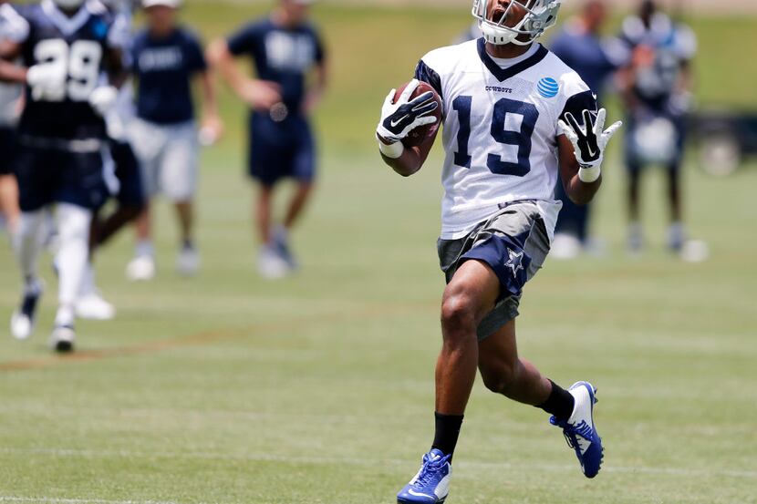 Dallas Cowboys wide receiver Brice Butler (19) isn't happy with a call after a pass...