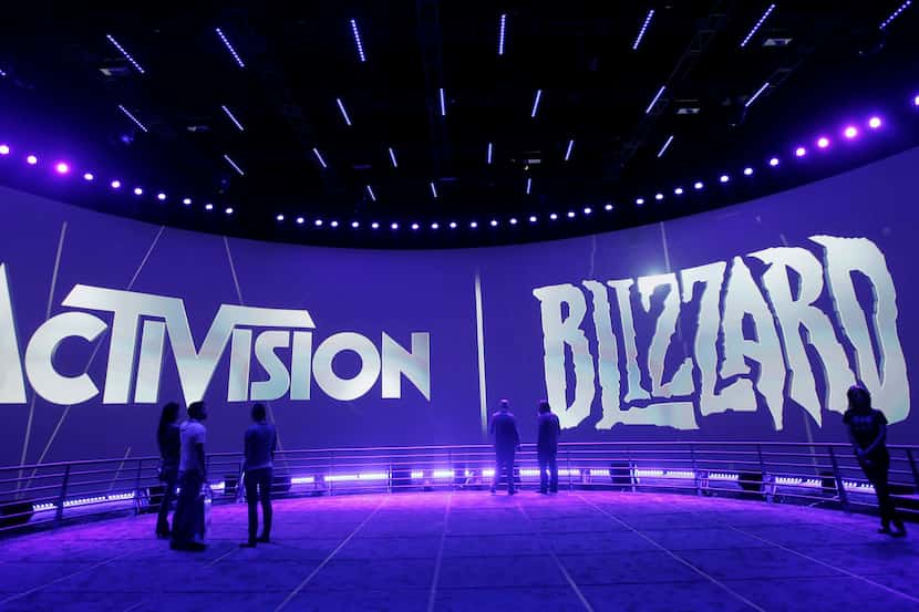 FILE - This June 13, 2013 file photo shows the Activision Blizzard Booth during the...