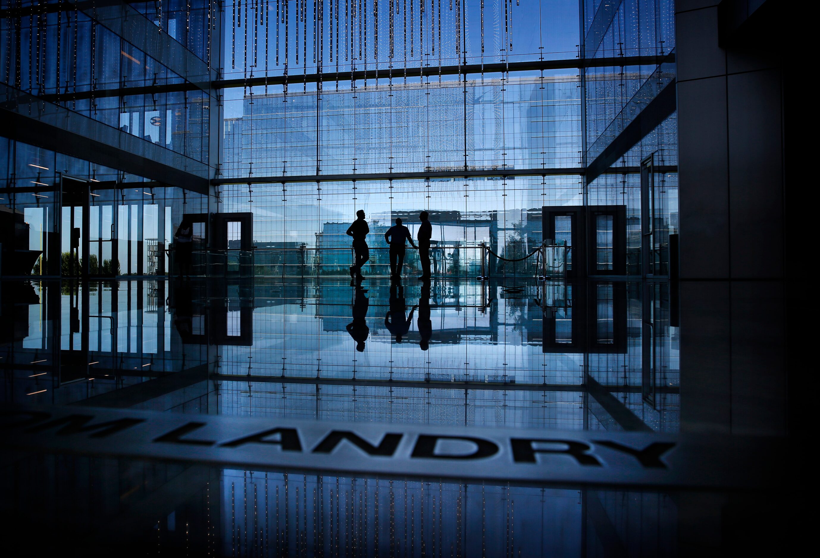 The late head coach Tom Landry's name appears on the floor of the The Star lobby in Frisco,...