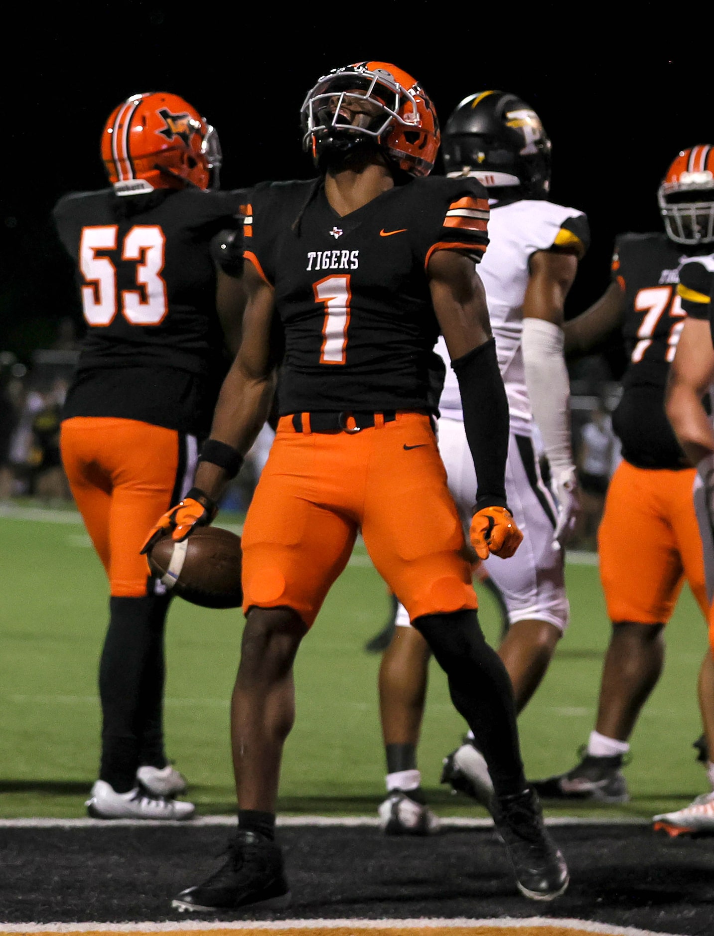 Lancaster running back Kyson Brown celebrates a touchdown run against Forney during the...