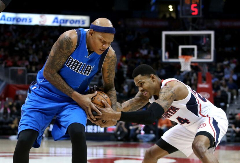 Feb 25, 2015; Atlanta, GA, USA; Dallas Mavericks forward Charlie Villanueva (3) and Atlanta...