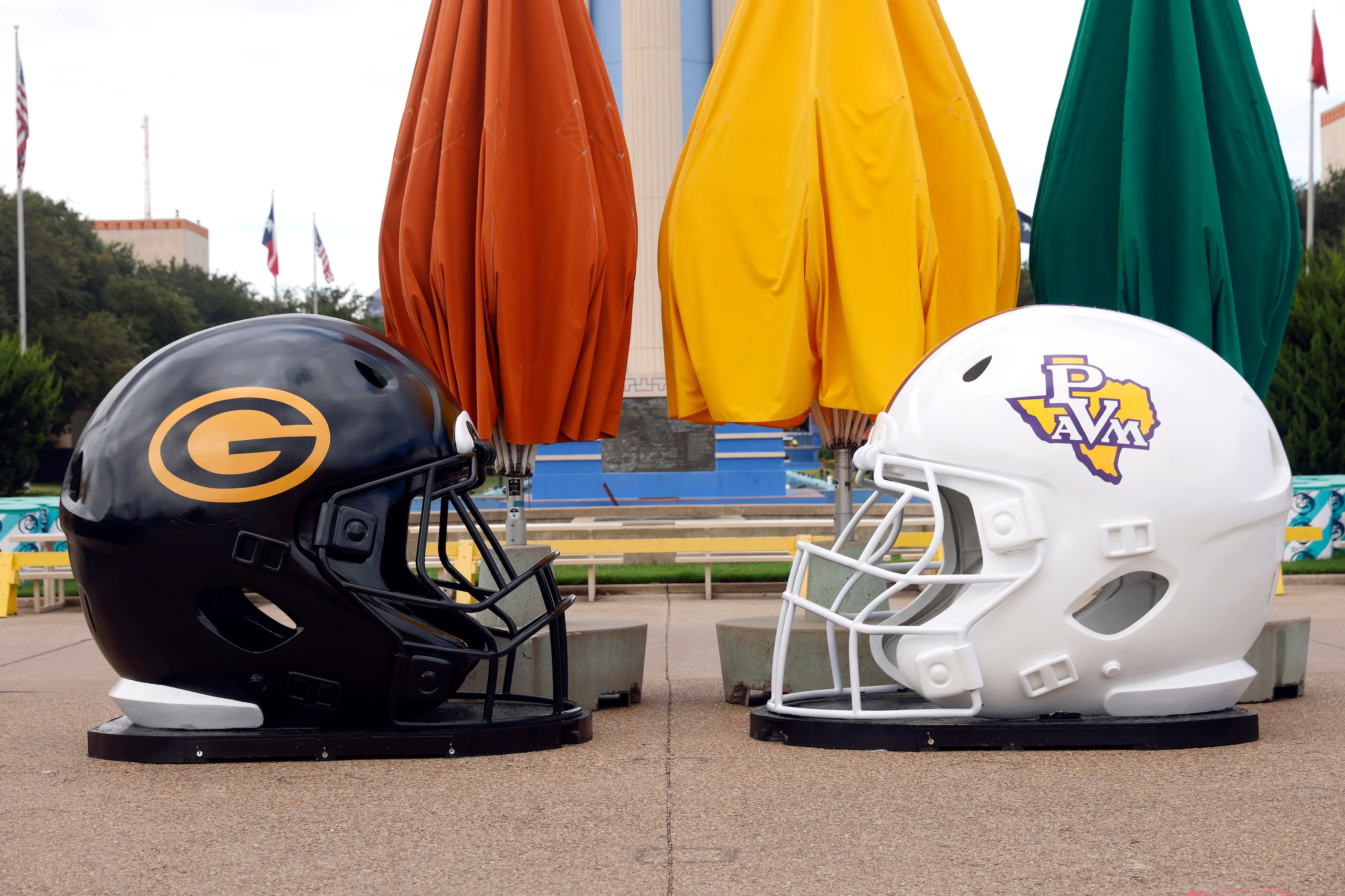 Larger than life Grambling State and Prairie View A&M  helmets are positioned in front o the...