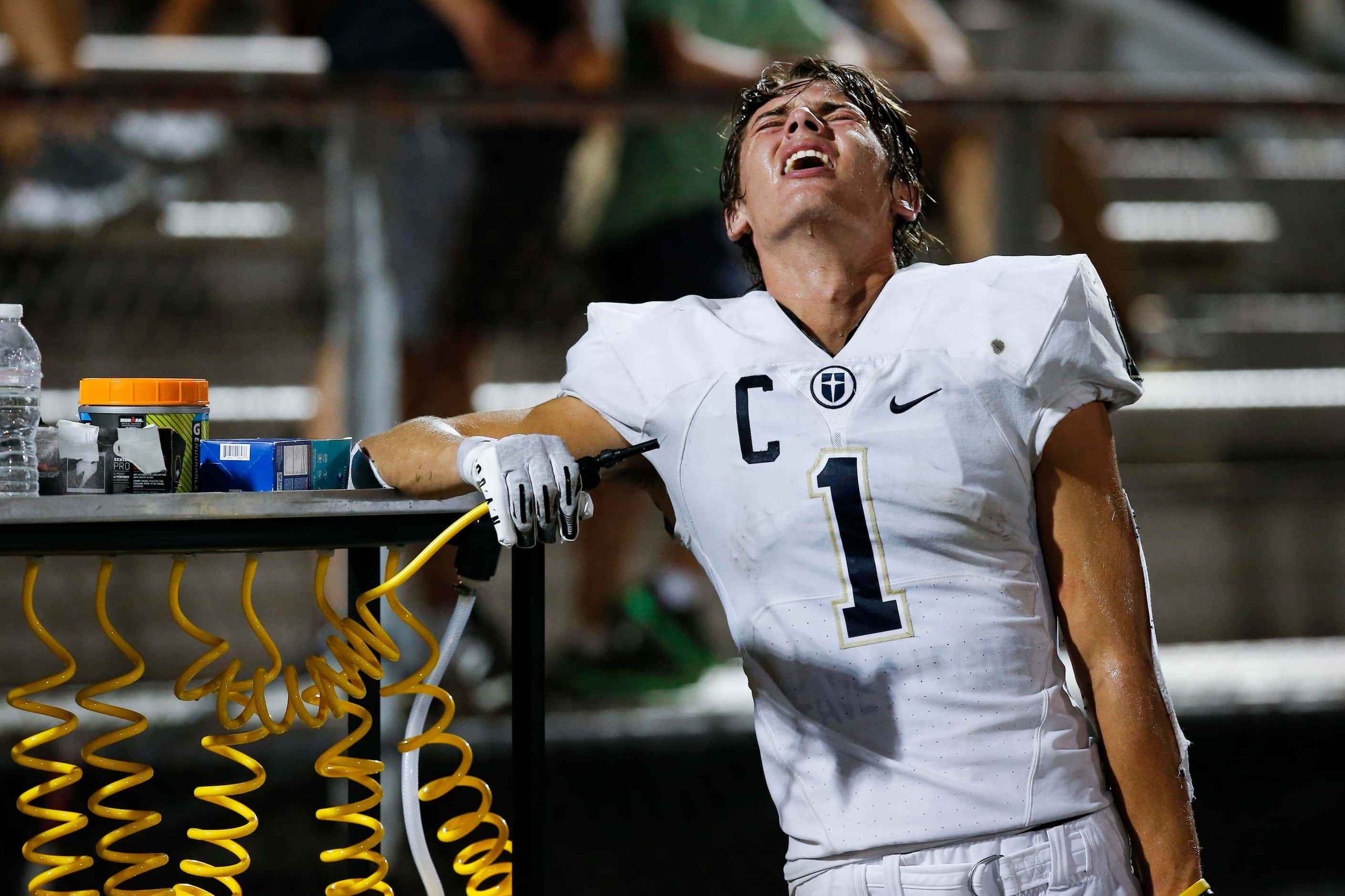 Jesuit senior wide receiver Hunter Krepp reacts on the sidelines as the first half of a high...