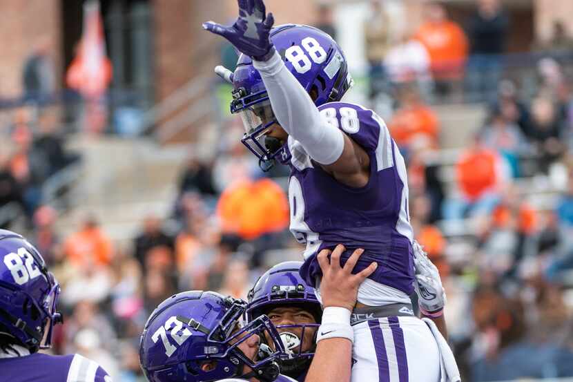 Anna’s wide receiver Jonathan Brown (88) celebrates his touchdown reception with Sam Soto...