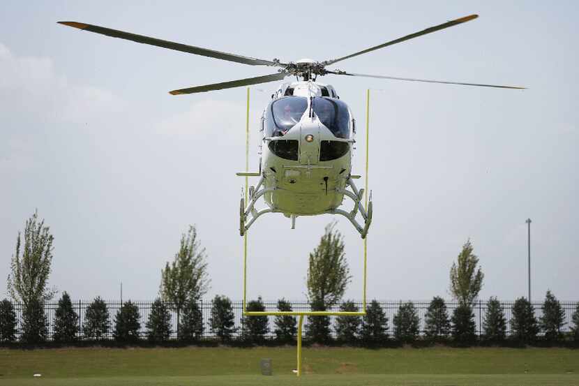 Dallas Cowboys owner Jerry Jones arrives as the team unveils its new corporate helicopter to...