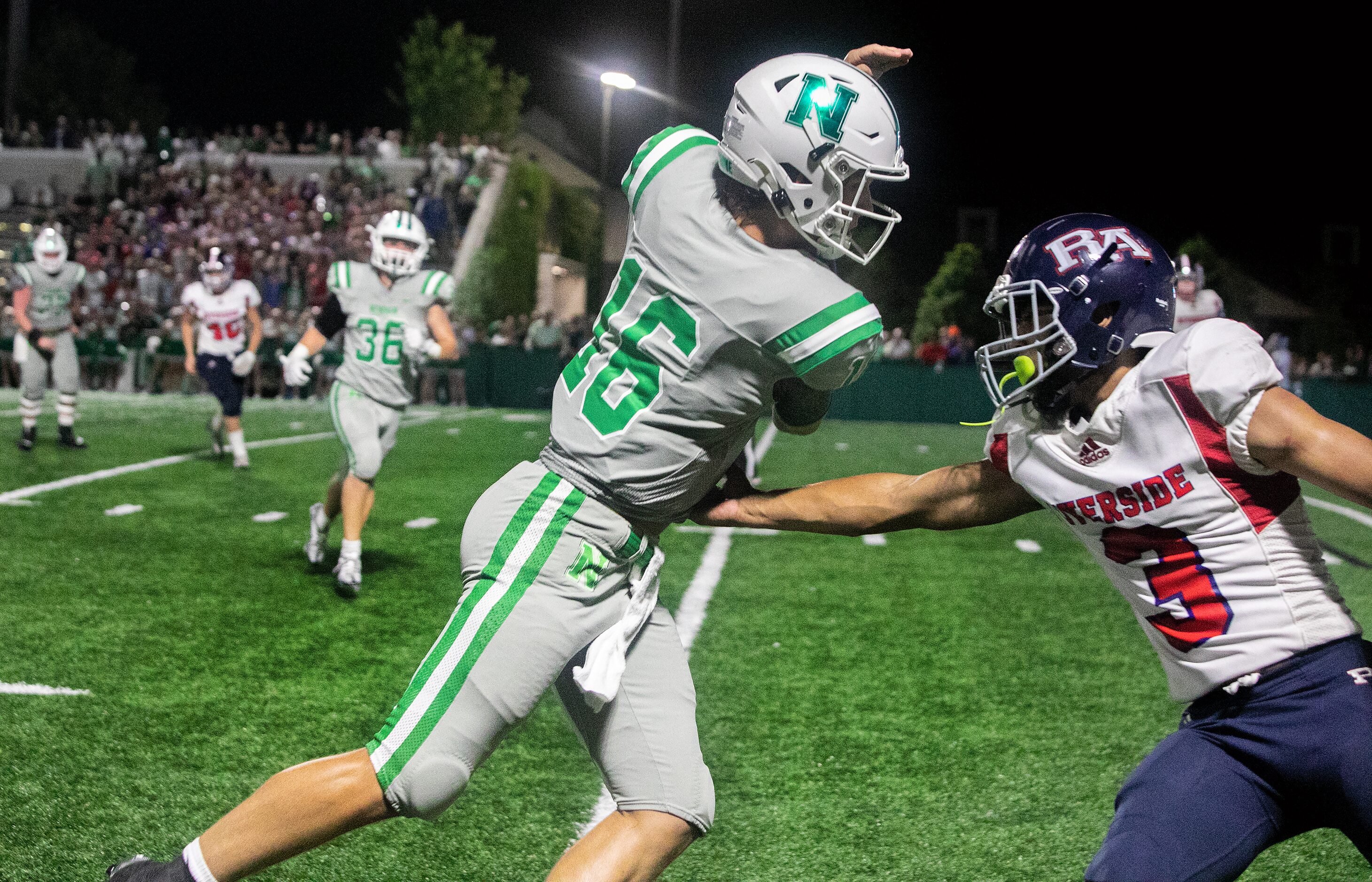 Arch Manning scrambles for the end zone during a touchdown run as Newman High School takes...