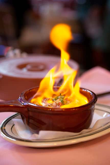 Queso flamedo is a dramatic dish at Las Palmas in Dallas.