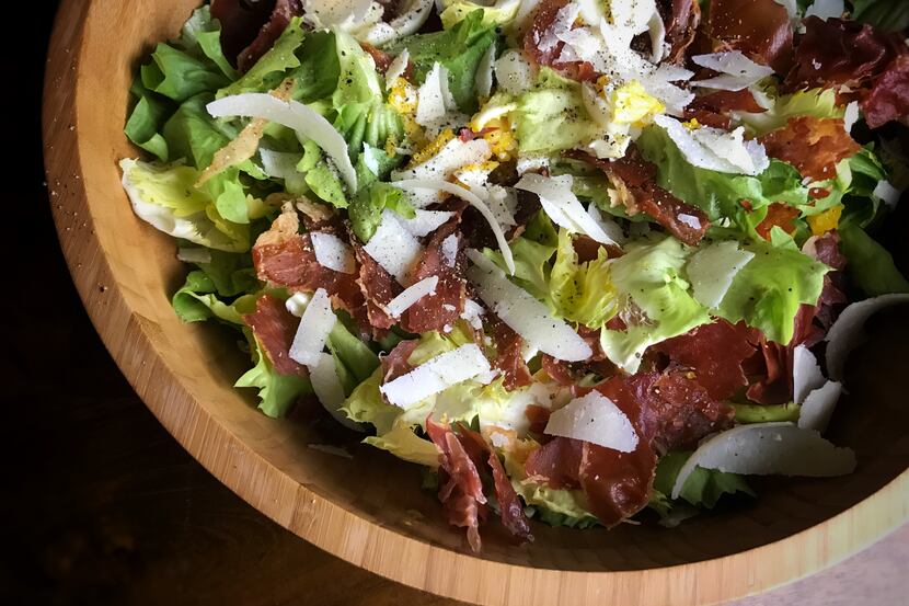 Escarole and crispy prosciutto salad with 6-minute eggs and shaved Parmesan. The salad was...