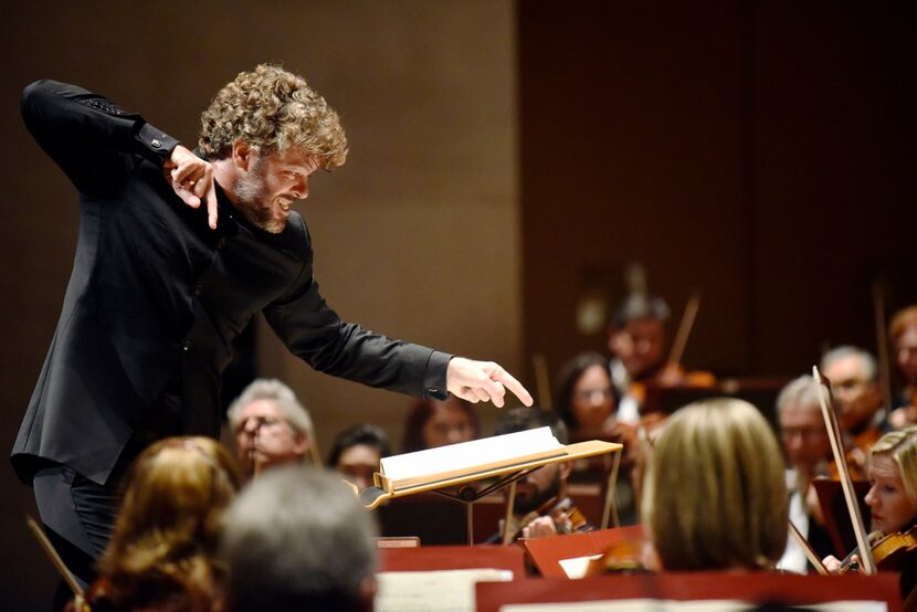 Guest conductor Pablo Heras-Casado conducts the Dallas Symphony Orchestra during a...